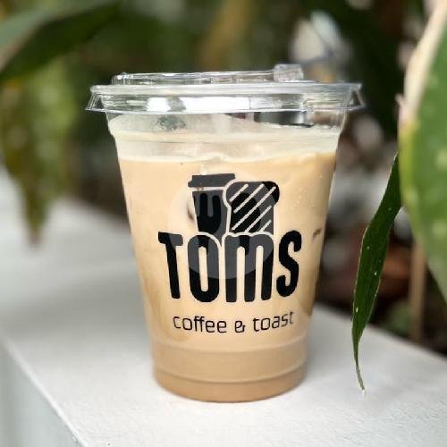 Es Kopi Susu Pina Colada menu Roti Bakar & Kopi TOMS Coffee & Toast, Sunda