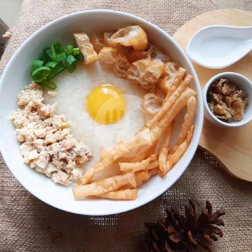 Bubur Ayam Kota Kuning Telur Ayam Mentah menu Bubur Ayam Kota Ibu Ninik, Ciputat