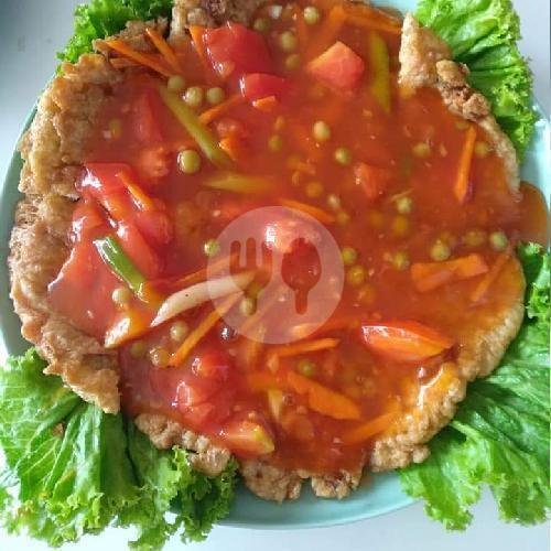 Es Sonkit (jeruk Skw) menu Rumah Makan Ahon, Tambora