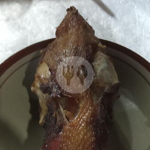 Kepala Ayam Kampung menu Bubur Sop Ayam Mamg Ipin