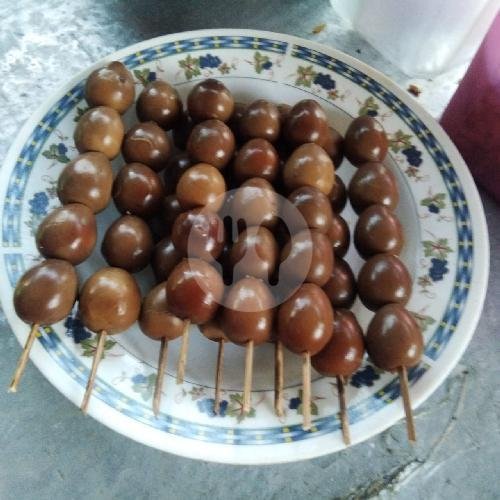 Telur Puyuh menu Bubur Ayam Mang Dadang Colomadu