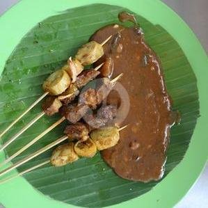 Sate (8 tusuk) + 1/2 Ketupat menu Sate Padang Jaso Kawan, Terusan Jakarta