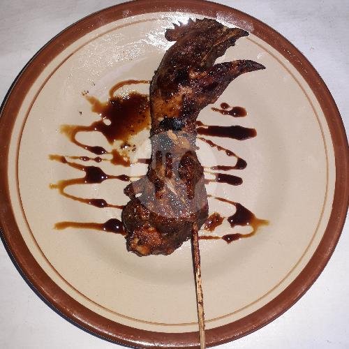 Lontong menu Sate Ayam Madura Cak Romli, Minggir