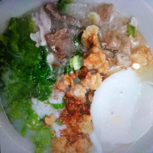 Bubur Ikan menu Bubur Singkawang Akhian, Tambora