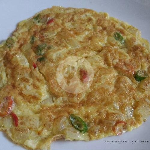 Telur Ceplok menu Ayam Geprek Warjo, Samping Unsil