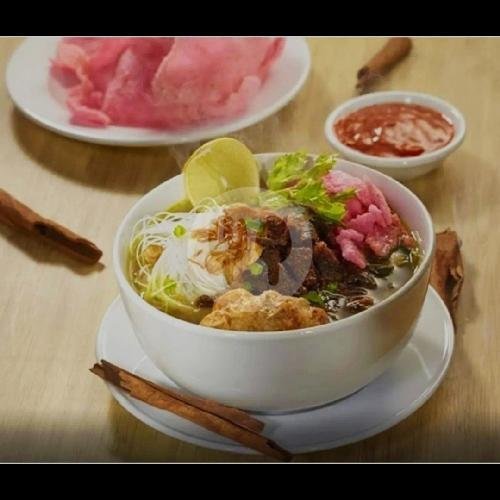 Tambahan Toping Telur Bulat menu Ketupat Sayur & Soto Padang Surya Baru, Cinere Raya