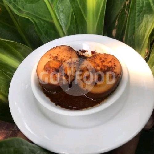 Garang Asem Ayam menu Ayam Goreng Ny Suharti, Sulawesi