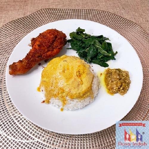 Paket Nasi Ayam Gulai menu Rumah Makan Padang Nusa Indah, Dau
