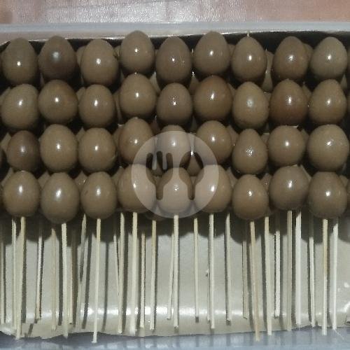 telur asin menu Bubur Ayam Pak Radi, HOS Cokroaminoto