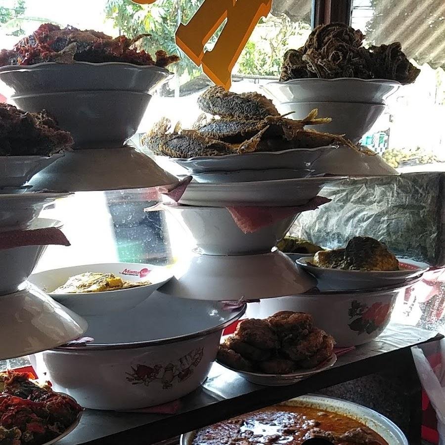 Rumah Makan Padang Kurnia Saiyo, Mayor SL Tobing