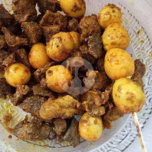 Telor Puyuh menu Bubur Ayam Aa Kamal Khas Pasundan, Pakis