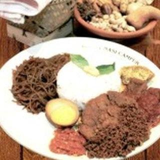 Nasi Kuning menu Depot Nasi Campur Pojok Tambak Bayan, Rungkut Asri