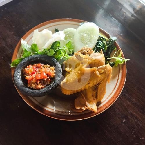 Dada ayam Goreng menu Bebek Dan Ayam Goreng Sari Asli Utara Jalan