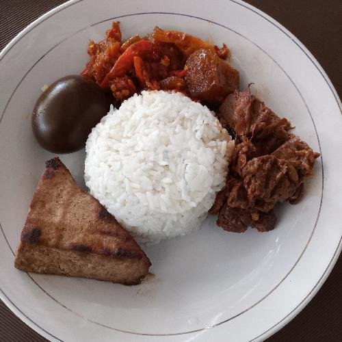 Nasi Uduk Telur Dadar menu Bubur Ayam Jakarta Bu Tyas
