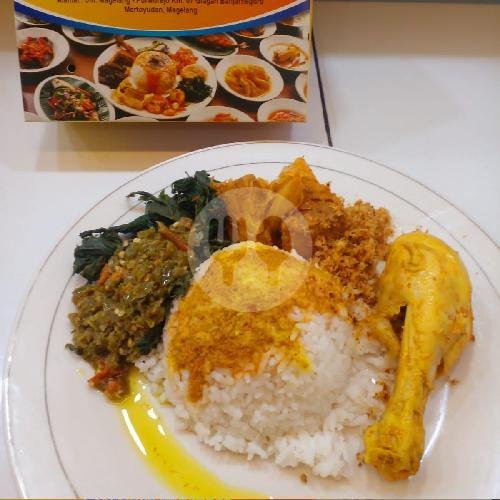 Ayam Gulai Upin menu RUMAH MAKAN PADANG GOMBANG ALAM