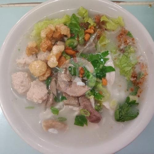 Bubur Singkawang Akhian: Nostalgia Kuliner yang Menghangatkan Hati di Tambora