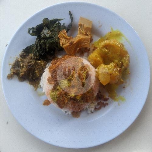 Gulai Ikan Mas Kuah Kuning menu Rumah Makan Padang Adinda Jaya